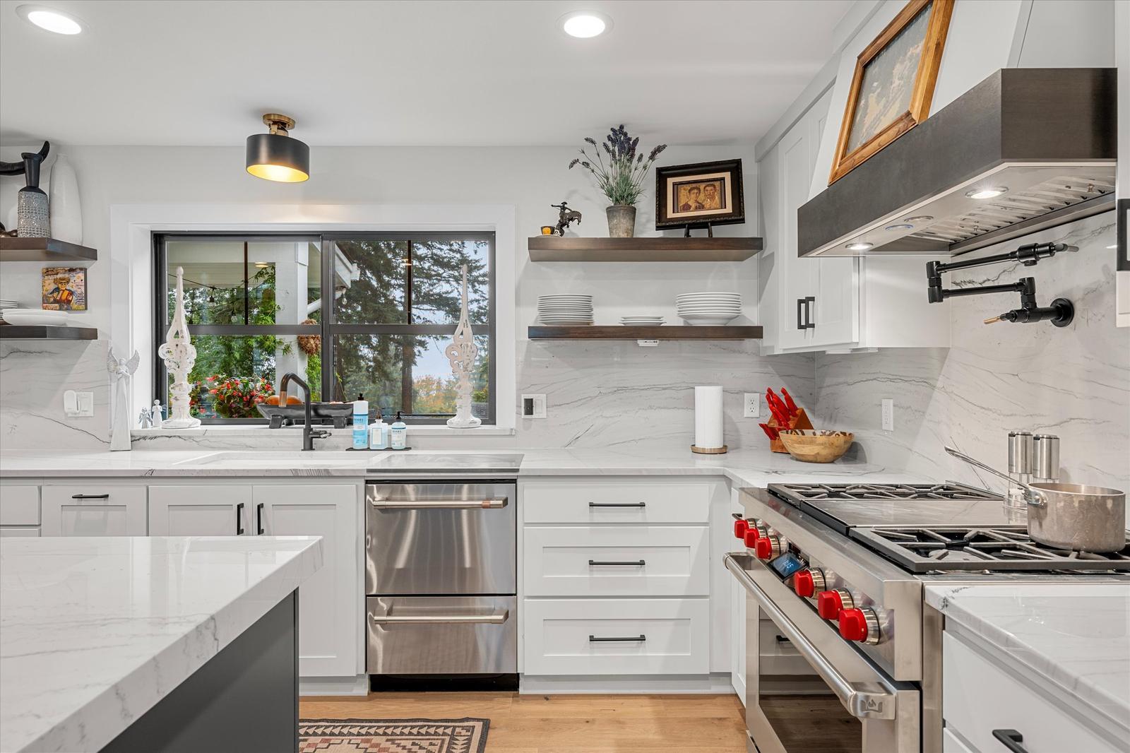 Kitchen range and pot filler